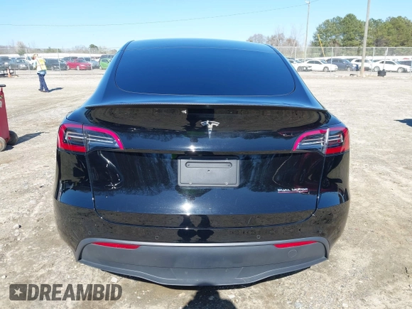 2021 Tesla Model Y Performance with VIN 5YJYGDEF6MF252877, listed as a IAAI auction lot 41770770 with 58,550 mi miles and . Bid and sale history available at DreamBid. Image 16.