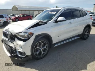 2016 BMW X1 xDrive28i z VIN WBXHT3C31GP880552, wystawiony jako Copart lot #52931305 z przebiegiem 127 225 mil mil oraz Szkoda całkowita • Salvage title. Historia ofert i sprzedaży dostępna na DreamBid. Obrazek 1.
