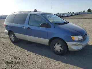 1998 Toyota Sienna LE with VIN 4T3ZF13CXWU011884, listed as a Copart auction lot 54601885 with 205,989 mi miles and Salvage Title. Bid and sale history available at carsss.com. Image 4.