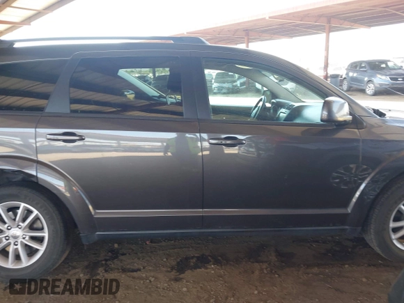 2015 Dodge Journey SXT with VIN 3C4PDCBG6FT569512, listed as a IAAI auction lot 42532676 with 98,952 mi miles and . Bid and sale history available at DreamBid. Image 13.