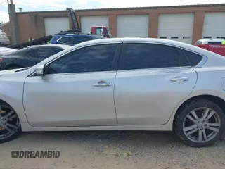 2013 Nissan Altima SL with VIN 1N4BL3AP5DC162522, listed as a IAAI auction lot 41684332 with 161,423 mi miles and . Bid and sale history available at DreamBid. Image 14.