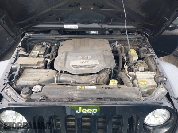 2015 Jeep Wrangler Unlimited Willys Wheeler with VIN 1C4BJWDG4FL687829, listed as a IAAI auction lot 42099147 with 98,969 mi miles and . Bid and sale history available at DreamBid. Image 10.