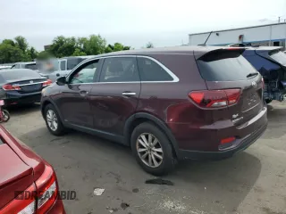 2019 Kia Sorento LX z VIN 5XYPGDA3XKG558803, wystawiony jako Copart lot #57885915 z przebiegiem 70 055 mil mil oraz Szkoda całkowita • Salvage title. Historia ofert i sprzedaży dostępna na DreamBid. Obrazek 2.