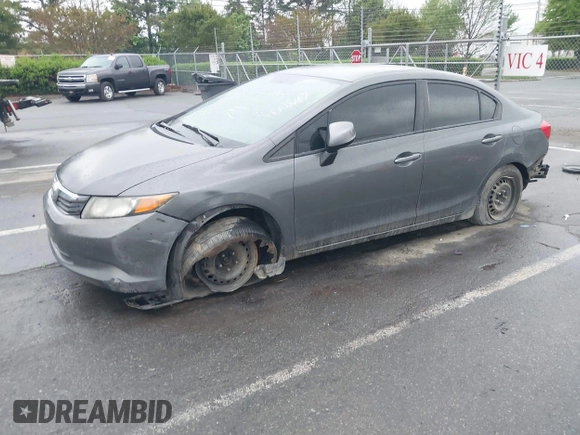 2012 Honda Civic LX with VIN 2HGFB2F58CH593658, listed as a IAAI auction lot 41965400 with 172,340 mi miles and . Bid and sale history available at DreamBid. Image 17.
