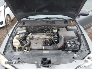 2004 Pontiac Grand Am SE with VIN 1G2NE52FX4M674634, listed as a IAAI auction lot 41547421 with 125,225 mi miles. Bid and sale history available at carsss.com. Image 10.