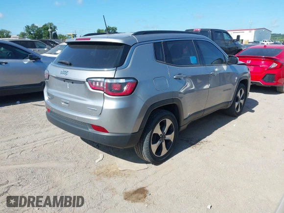 2017 Jeep Compass Latitude with VIN 3C4NJDBBXHT656407, listed as a IAAI auction lot 42562826 with 78,057 mi miles and . Bid and sale history available at DreamBid. Image 4.