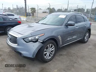 2014 Infiniti QX70 with VIN JN8CS1MU8EM450428, listed as a IAAI auction lot 42233727 with 88,342 mi miles and . Bid and sale history available at DreamBid. Image 2.
