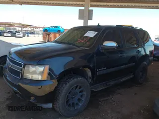 2007 Chevrolet Tahoe LS with VIN 1GNFC13C07R266418, listed as a IAAI auction lot 42435750 with 321,712 mi miles and . Bid and sale history available at DreamBid. Image 2.