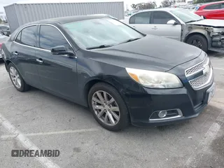 2013 Chevrolet Malibu LTZ with VIN 1G11H5SA2DU125573, listed as a IAAI auction lot 42047422 with 165,493 mi miles and . Bid and sale history available at DreamBid. Image 1.