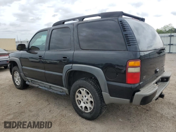 2003 Chevrolet Tahoe Z71 z VIN 1GNEK13Z13R301464, wystawiony jako Copart lot #53905395 z przebiegiem 165 360 mil mil oraz Szkoda całkowita • Salvage title. Historia ofert i sprzedaży dostępna na DreamBid. Obrazek 2.