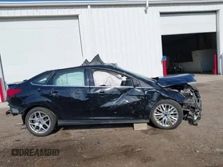 2016 Ford Focus Titanium with VIN 1FADP3J22GL242818, listed as a IAAI auction lot 42177015 with Not provided miles and . Bid and sale history available at DreamBid. Image 13.
