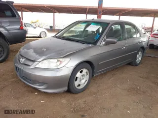 2004 Honda Civic Hybrid with VIN JHMES95654S018200, listed as a IAAI auction lot 41912912 with 291,301 mi miles. Bid and sale history available at carsss.com. Image 2.