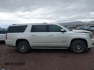 2015 GMC Yukon XL Denali with VIN 1GKS2JKJ2FR590502, listed as a IAAI auction lot 41758575 with 129,777 mi miles. Bid and sale history available at carsss.com. Image 12.