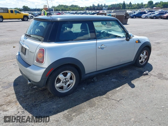 2009 MINI Hardtop with VIN WMWMF335X9TU71767, listed as a IAAI auction lot 42696886 with 105,408 mi miles and . Bid and sale history available at DreamBid. Image 4.
