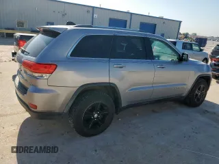 2014 Jeep Grand Cherokee Laredo with VIN 1C4RJEAG4EC182773, listed as a Copart auction lot 54085255 with 138,775 mi miles and Salvage Title. Bid and sale history available at DreamBid. Image 3.