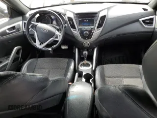 2016 Hyundai Veloster z VIN KMHTC6AD6GU263245, wystawiony jako Copart lot #51296685 z przebiegiem 132 889 mil mil oraz Szkoda całkowita • Salvage title. Historia ofert i sprzedaży dostępna na DreamBid. Obrazek 8.