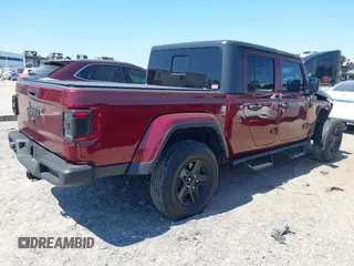 2021 Jeep Gladiator Freedom with VIN 1C6HJTAG2ML549434, listed as a IAAI auction lot 42059434 with 29,041 mi miles and . Bid and sale history available at DreamBid. Image 4.
