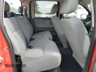 2010 Dodge Dakota Bighorn/Lonestar z VIN 1D7CW3GK9AS228269, wystawiony jako Copart lot #54786095 z przebiegiem 175 749 mil mil oraz Szkoda całkowita • Salvage title. Historia ofert i sprzedaży dostępna na DreamBid. Obrazek 10.