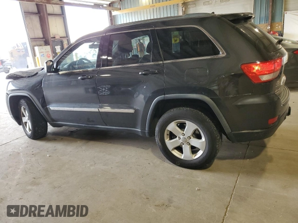 2011 Jeep Grand Cherokee Laredo with VIN 1J4RR4GG6BC657808, listed as a Copart auction lot 55255685 with 86,941 mi miles and Salvage title. Bid and sale history available at DreamBid. Image 2.