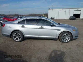2014 Ford Taurus Limited with VIN 1FAHP2F86EG134779, listed as a IAAI auction lot 41660527 with 115,016 mi miles. Bid and sale history available at carsss.com. Image 13.