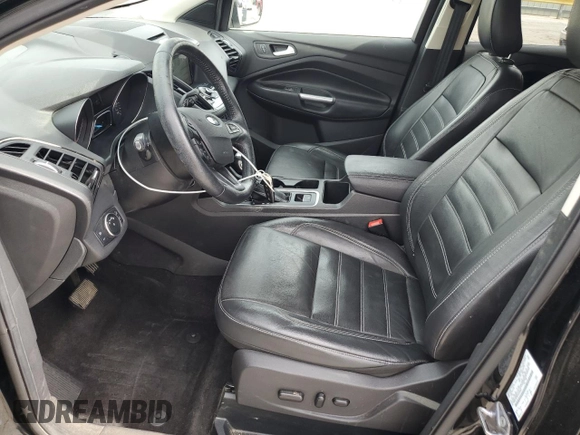 2018 Ford Escape Titanium with VIN 1FMCU0J92JUC84901, listed as a Copart auction lot 60428635 with 69,210 mi miles and Salvage title. Bid and sale history available at DreamBid. Image 7.