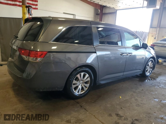 2014 Honda Odyssey EX-L with VIN 5FNRL5H6XEB134849, listed as a Copart auction lot 63617435 with 127,491 mi miles and Salvage title. Bid and sale history available at DreamBid. Image 3.