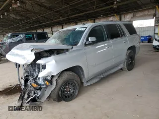 2015 Chevrolet Tahoe LS with VIN 1GNSCAEC3FR115468, listed as a Copart auction lot 47377615 with 145,897 mi miles and Salvage title. Bid and sale history available at DreamBid. Image 1.