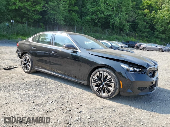 2024 BMW 5 Series 530i xDrive with VIN WBA53FJ04RCP87607, listed as a Copart auction lot 58768065 with 11,596 mi miles and Salvage title. Bid and sale history available at DreamBid. Image 4.