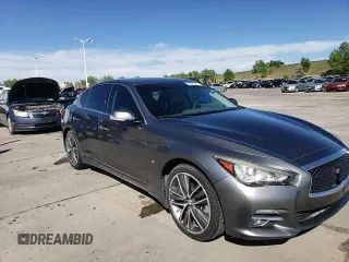 2015 Infiniti Q50 Premium z VIN JN1BV7AR6FM401105, wystawiony jako Copart lot #56982265 z przebiegiem 108 256 mil mil oraz Czysty tytuł • Clean title. Historia ofert i sprzedaży dostępna na DreamBid. Obrazek 13.