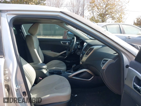 2012 Hyundai Veloster w/Gray Int with VIN KMHTC6AD0CU068400, listed as a IAAI auction lot 41493521 with 72,682 mi miles and . Bid and sale history available at DreamBid. Image 5.