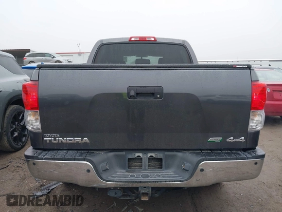 2012 Toyota Tundra 4WD Truck LTD with VIN 5TFHW5F17CX211075, listed as a IAAI auction lot 41510976 with 204,930 mi miles. Bid and sale history available at carsss.com. Image 17.
