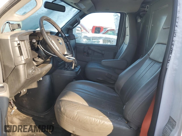 2017 Chevrolet Express Cargo with VIN 1GCWGAFF9H1289313, listed as a Copart auction lot 86978034 with 202,794 mi miles and Salvage title. Bid and sale history available at DreamBid. Image 7.