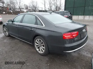 2012 Audi A8 L with VIN WAURVAFD7CN011767, listed as a IAAI auction lot 41848096 with 98,397 mi miles. Bid and sale history available at carsss.com. Image 3.