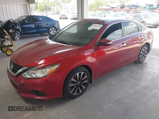 2018 Nissan Altima 2.5 S with VIN 1N4AL3AP5JC212083, listed as a IAAI auction lot 42181501 with 112,031 mi miles. Bid and sale history available at carsss.com. Image 2.