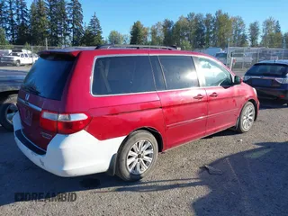 2005 Honda Odyssey TOURING with VIN 5FNRL38815B008644, listed as a IAAI auction lot 40512794 with 279,981 mi miles. Bid and sale history available at carsss.com. Image 4.