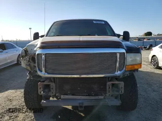 2000 Ford Super Duty F-250 XL with VIN 1FTNW21S9YEA79229, listed as a Copart auction lot 79939304 with 276,795 mi miles and Salvage Title. Bid and sale history available at carsss.com. Image 5.