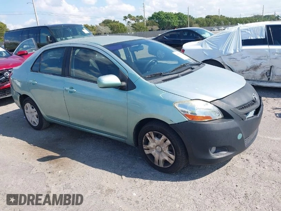 2008 Toyota Yaris with VIN JTDBT923384015057, listed as a IAAI auction lot 41879099 with 184,995 mi miles. Bid and sale history available at carsss.com. Image 1.