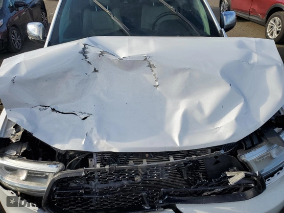 2014 Dodge Durango Citadel with VIN 1C4SDJET9EC303953, listed as a Copart auction lot 42449905 with 149,089 mi miles and Salvage Title. Bid and sale history available at DreamBid. Image 12.