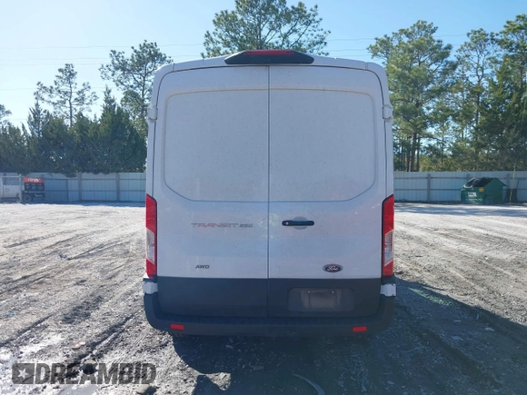 2023 Ford Transit Cargo with VIN 1FTBR2C8XPKA33372, listed as a IAAI auction lot 41735299 with 56,777 mi miles and . Bid and sale history available at DreamBid. Image 16.