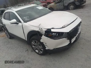 2021 Mazda CX-30 Premium with VIN 3MVDMADL5MM318729, listed as a IAAI auction lot 41645560 with 51,132 mi miles and . Bid and sale history available at DreamBid. Image 1.