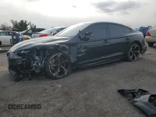2022 Audi RS 5 Sportback z VIN WUAAWCF50NA902918, wystawiony jako Copart lot #87485234 z przebiegiem 33 427 mil mil oraz Szkody całkowita. Historia ofert i sprzedaży dostępna na DreamBid. Obrazek 1.