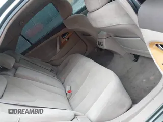 2007 Toyota Camry CE z VIN 4T1BE46K37U716769, wystawiony jako IAAI lot #42233779 z przebiegiem 166 265 mil mil oraz . Historia ofert i sprzedaży dostępna na DreamBid. Obrazek 8.