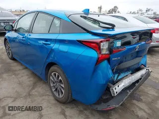 2020 Toyota Prius L Eco z VIN JTDKARFU9L3104395, wystawiony jako IAAI lot #42207156 z przebiegiem 85 572 mil mil oraz . Historia ofert i sprzedaży dostępna na DreamBid. Obrazek 3.