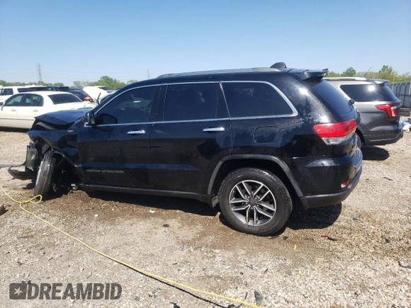 2019 Jeep Grand Cherokee Limited with VIN 1C4RJFBG5KC713902, listed as a Copart auction lot 57871925 with 119,778 mi miles and Salvage title. Bid and sale history available at DreamBid. Image 2.