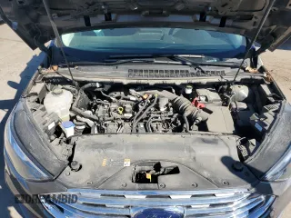 2021 Ford Edge SE z VIN 2FMPK4G98MBA23711, wystawiony jako Copart lot #76259054 z przebiegiem 20 879 mil mil oraz Czysty tytuł • Clean title. Historia ofert i sprzedaży dostępna na DreamBid. Obrazek 12.
