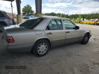 1995 Mercedes-Benz E Class with VIN WDBEA32E4SC269955, listed as a Copart auction lot 72137264 with 218,960 mi miles and Salvage Title. Bid and sale history available at carsss.com. Image 3.
