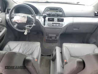 2008 Honda Odyssey EX-L with VIN 5FNRL38628B414581, listed as a Copart auction lot 52548104 with 236,692 mi miles and Salvage Title. Bid and sale history available at DreamBid. Image 8.