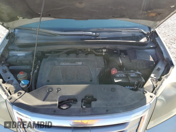 2009 Honda Odyssey EX-L with VIN 5FNRL38799B034292, listed as a Copart auction lot 52547205 with 116,658 mi miles and Salvage Title. Bid and sale history available at DreamBid. Image 14.