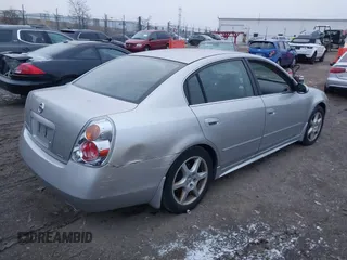 2003 Nissan Altima SE z VIN 1N4BL11E33C302441, wystawiony jako IAAI lot #41156458 z przebiegiem 123 796 mil mil oraz . Historia ofert i sprzedaży dostępna na DreamBid. Obrazek 4.