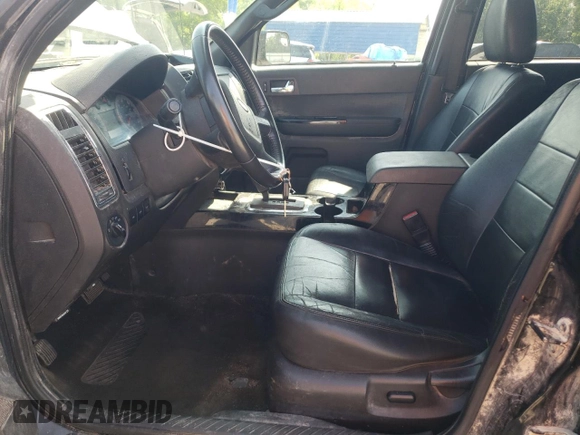 2010 Ford Escape Limited with VIN 1FMCU0E79AKA45236, listed as a Copart auction lot 60406005 with 237,385 mi miles and Salvage title. Bid and sale history available at DreamBid. Image 7.